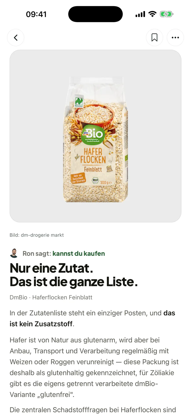 Frag Ron zeigt die Produktseite von dmBio Haferflocken: Ron sagt „kannst du kaufen“, nur eine Zutat, das ist die ganze Liste.